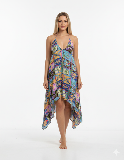 Woman wearing a colorful patterned dress on a white background