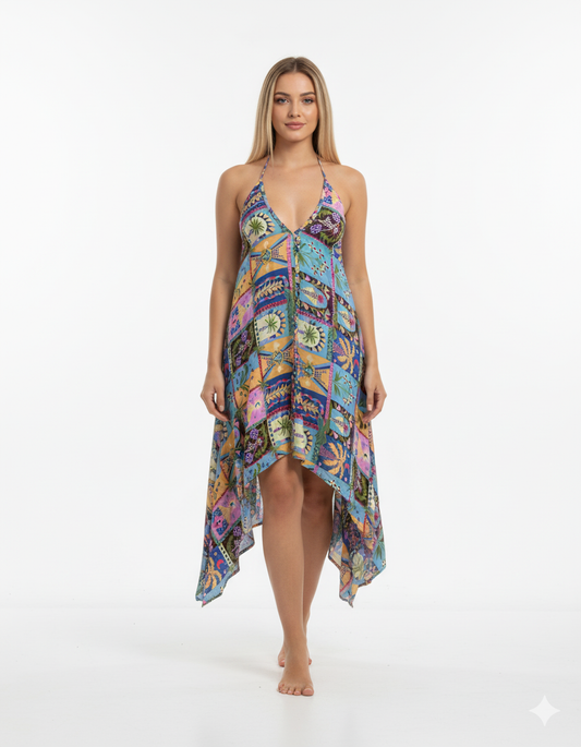 Woman wearing a colorful patterned dress on a white background